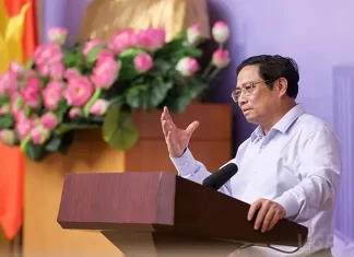 Thủ tướng Phạm Minh Chính tại Hội nghị phát triển thị trường bất động sản chiều 14/7. Ảnh: Nhật Bắc